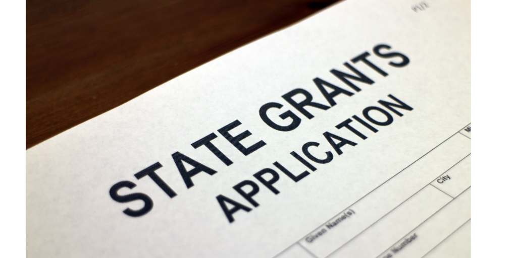 Application for state grants related to school transportation for K-12 districts, focusing on federal and state plans.